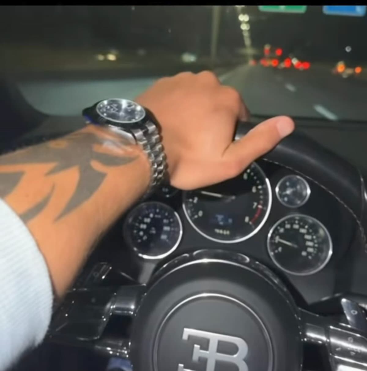 Driving at night, a watch on the wrist